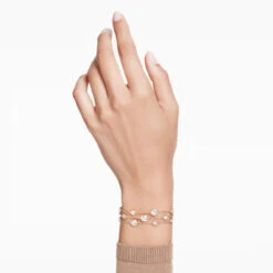 Imber Wide Bracelet, Round Cut, White, Gold-Tone Plated 5680095 | Swarovski -four seasons jewelry shop b1e9ac09 8a43 5c44 8aae 9f4cf6ded27b 70623.1705912371